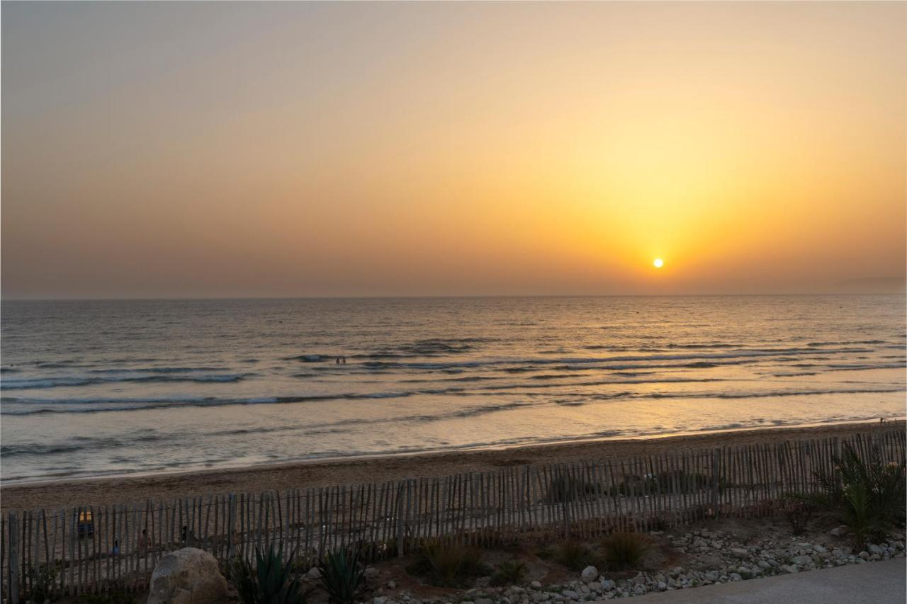 Pickalbatros White Beach Taghazout (Adults Only) Exterior photo Sunset at the beach